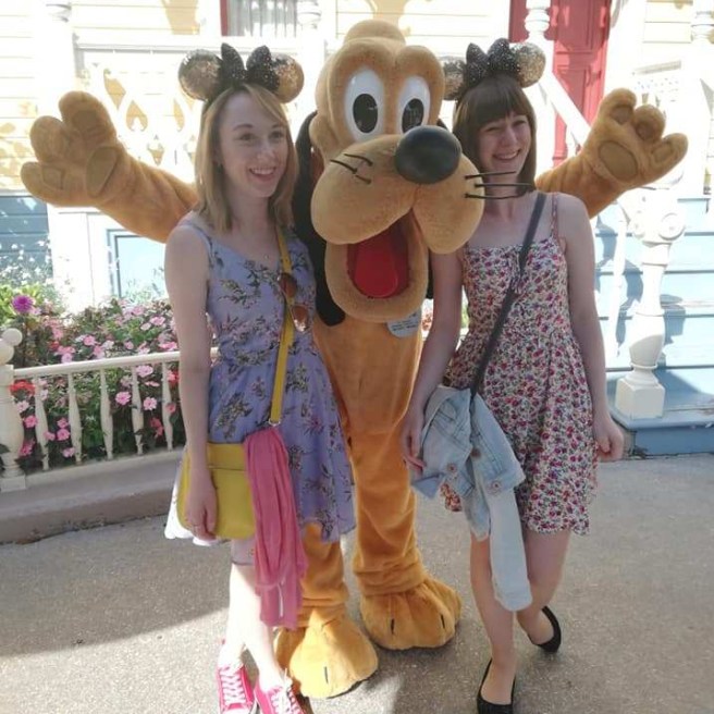 Lillie and I meeting Pluto on our trip to Disneyland Paris.