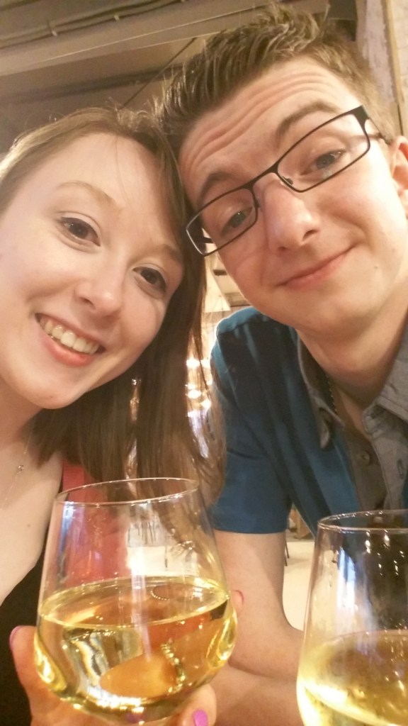 Photo of me and Liam drinking wine in a tapas bar. We are incredibly drunk.