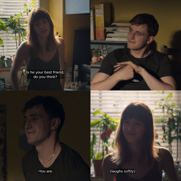 Still from Normal People. Marianne asks Connell "Is he your best friend, do you think?" Connell smiles at her and gets up to approach her, telling her "No. You are." Marianne smiles and laughs softly.