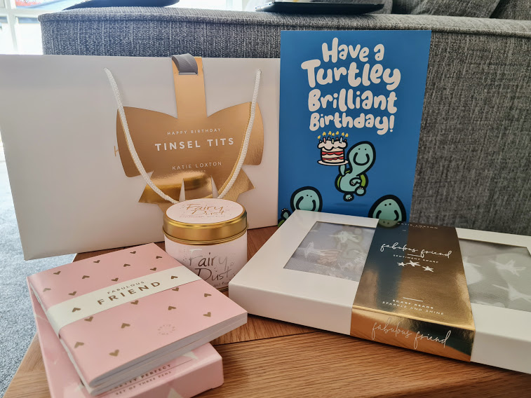 My birthday presents from Lillie - a gift bag, scented candle, notebook and pens with "Fabulous Friend" on and a star patterned scarf. There's also a birthday card that says "Have a turtley brilliant birthday!"