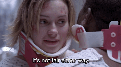 Tom and Bonnie are impaled together - they are both wearing neck braces and have scrapes and cuts on their faces. Bonnie tells a visibly upset Tom "it's not fair either way."