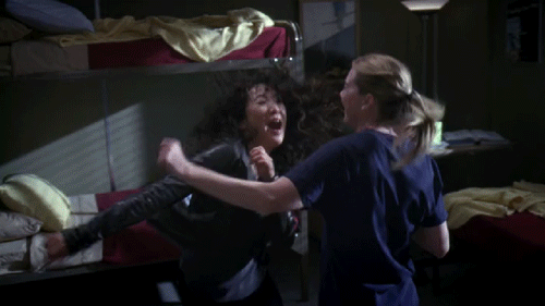 Meredith and Cristina dancing in an on-call room.