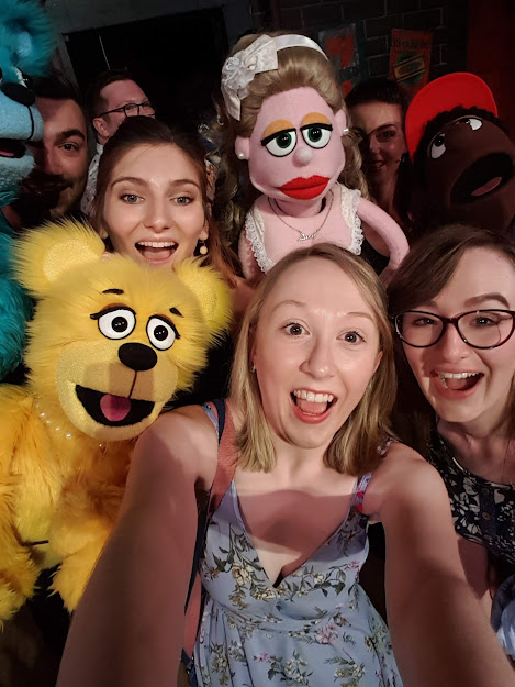 Colette and I surrounded by actors and Avenue Q puppets - including the Bad Idea Bears, Lucy the Slut, and Gary Coleman. 